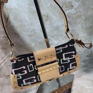 Y2K Guess black monogram shoulder bag with a G-logo pattern, tan faux leather